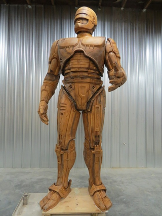 Illustration for article titled Giant RoboCop Statue Rises Just As Detroit Falls Into Financial Abyss